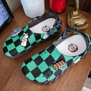 CROCS Green and Black Checkered Slippers